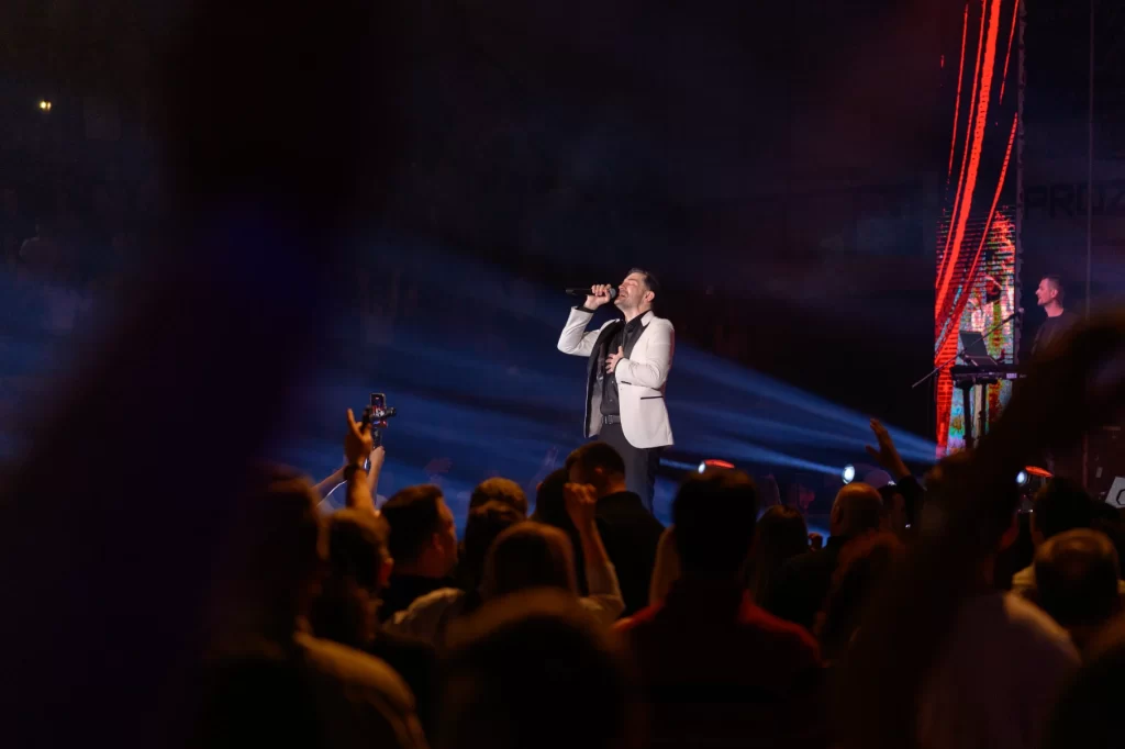 Mirza Selimović performing live on stage at a packed concert in SKPC Mejdan, Tuzla. Photos by Sinisa Zec Studio